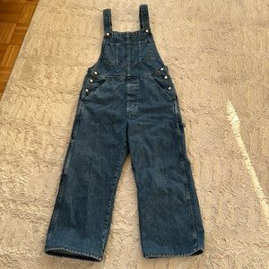 AMO x Donni denim overalls with pearl buttons